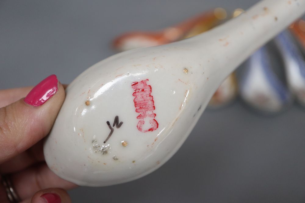 A Chinese enamel porcelain bowl, Daoguang mark and another bowl, various spoons and coral beads